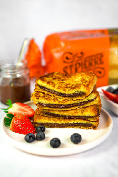 Easter recipe ideas: a photo of a Nutella-filled French toast recipe on a plate with strawberries and blueberries